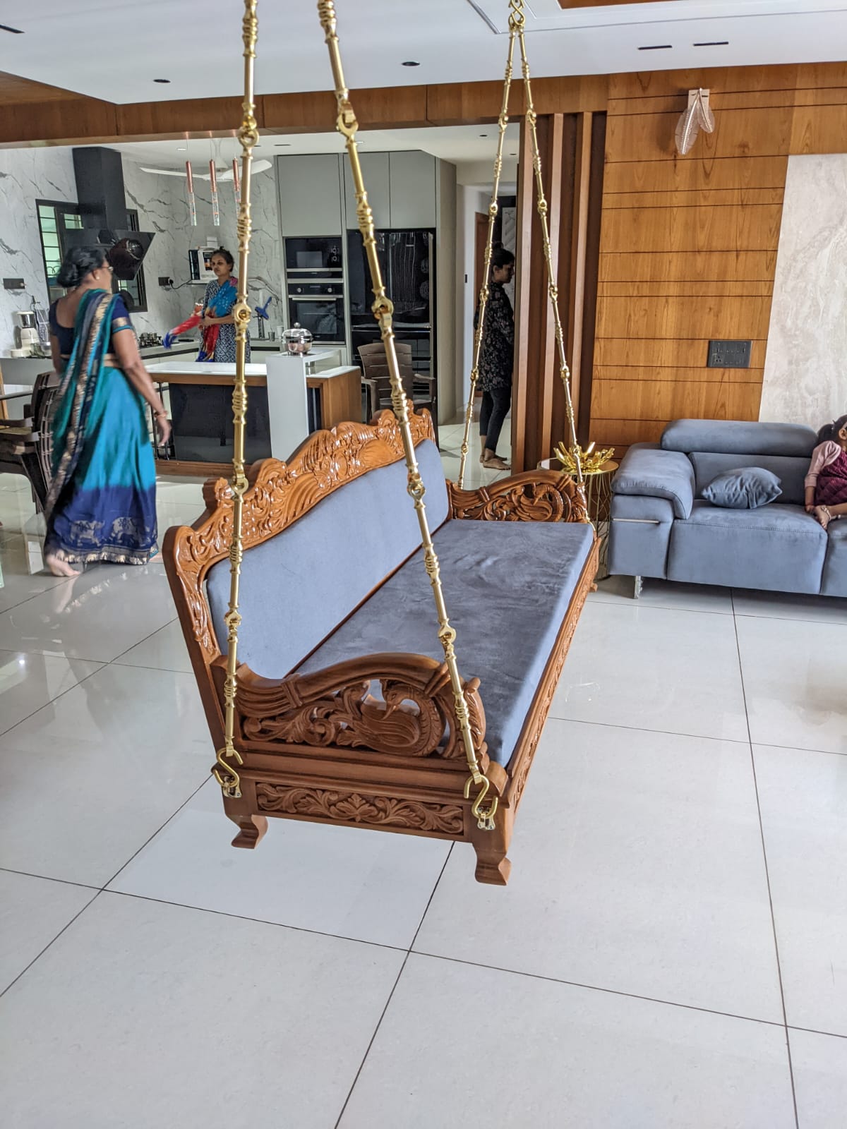 Kalaateet Wooden designer Carving swing with Brass chain and cushion